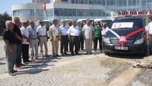 DOĞAN ÇELİK , BURHANİYE BELEDİYE'SİNE CENAZE ARABASI BAĞIŞLADI