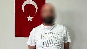 Gürcistan'da yakalanan 5'i kırmızı bültenle aranan 8 şüpheli Türkiye'ye getirildi